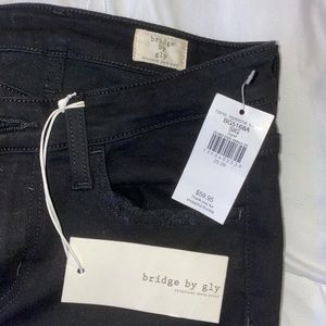 women’s black ripped jeans